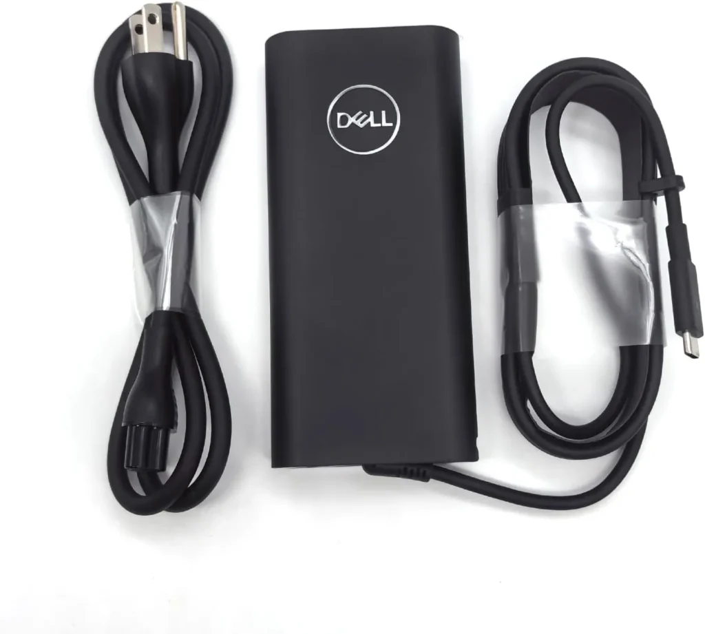 آداپتور دل 130 وات Type-C اورجینال در کنار لپ تاپ Dell XPS